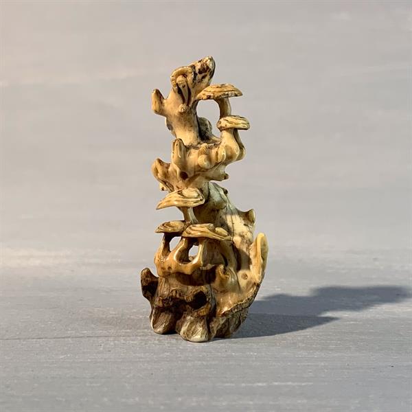 1. Ivory scholar sculpture