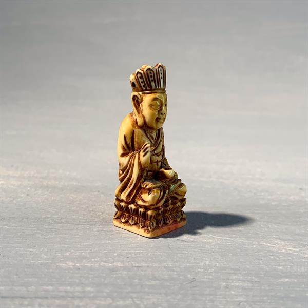 15. Ivory Seated Figure