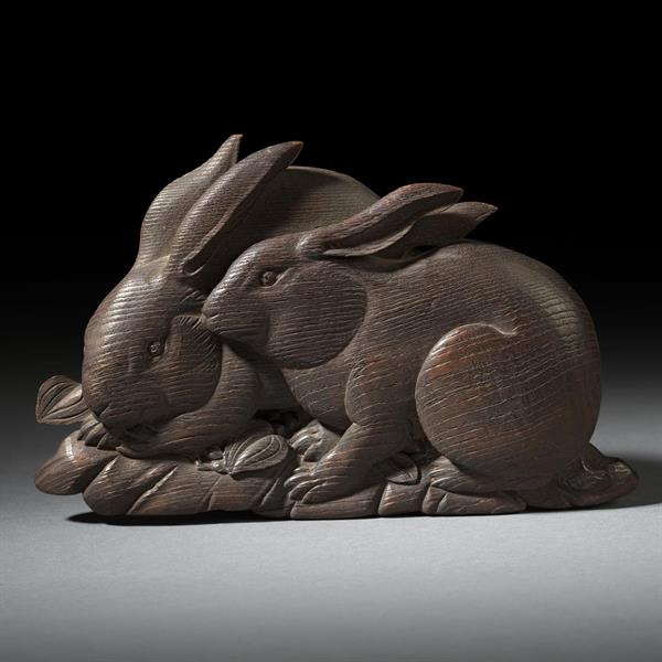 34. Carved Pair of Rabbits Amongst Foliage