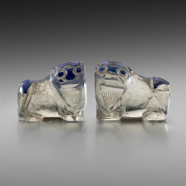 9. Pair of Carved Glass Foo Dogs