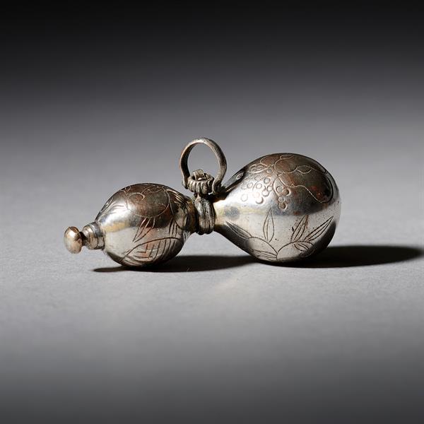 63. Silver Netsuke